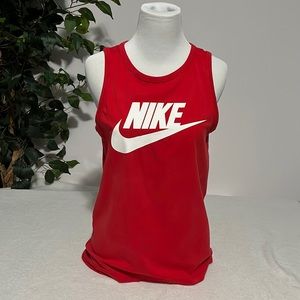 - The Nike tee size large, red, athletic cut.     B61